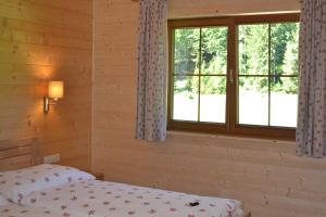 Letto o letti in una camera di Ferienwohnung Hinterwinkl