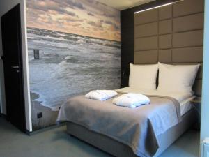 Posteľ alebo postele v izbe v ubytovaní Armada Holiday House