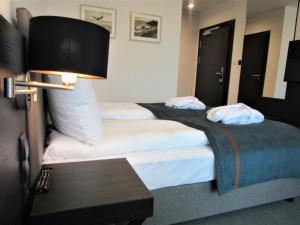 Posteľ alebo postele v izbe v ubytovaní Armada Holiday House