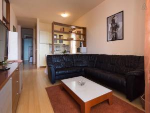 A seating area at Luxury front row designer apartment