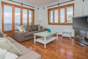 Posezení v ubytování Villa Ca'n Torrens Alcanada