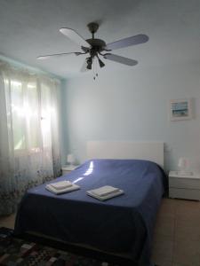 Een bed of bedden in een kamer bij Appartamenti Di Laura