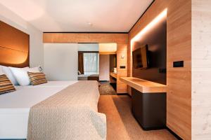 Postel nebo postele na pokoji v ubytování Rikli Balance Hotel – Sava Hotels & Resorts