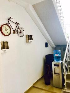 a bike hanging on a wall in a room at BSG Rustaveli 184 in K'obulet'i