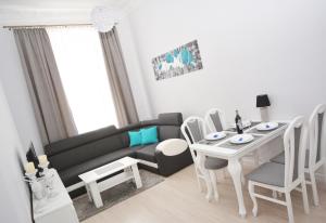 Posedenie v ubytovaní Apartament Pod Kopernikiem II