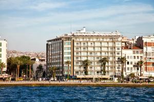 
a large body of water surrounded by buildings at Izmir Palas Hotel in İzmir
