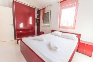 Posteľ alebo postele v izbe v ubytovaní Villa Antonio