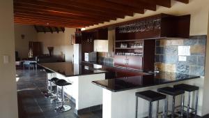 De lounge of bar bij Zebula Golf Estate and Spa - Open Horizon pax 10 Moi Signature Luxury villa