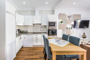 Kuchyň nebo kuchyňský kout v ubytování Casa Laranjinha + 6 fotografií