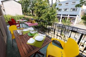 a balcony with a table and chairs on a balcony at BB Venice Cinzias' in Marghera