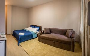 Postel nebo postele na pokoji v ubytování Apart Hotel Smart Studio