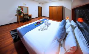 Cama ou camas em um quarto em Sea Diamond Plaza Apartments