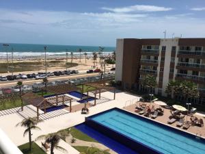 Vista de la piscina de Apartments Vg Fun Praia do Futuro o d'una piscina que hi ha a prop