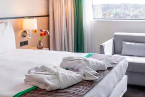 Postel nebo postele na pokoji v ubytování Park Inn by Radisson Leuven