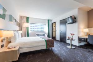 Postel nebo postele na pokoji v ubytování Park Inn by Radisson Leuven