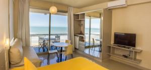 a living room with a view of the ocean at Mitre Al Mar in Ostende