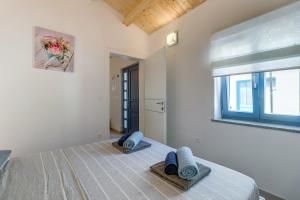 Postel nebo postele na pokoji v ubytování Apartments Relax