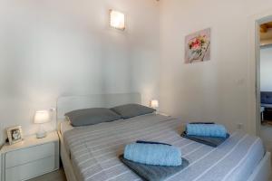Postel nebo postele na pokoji v ubytování Apartments Relax