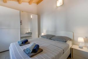 Postel nebo postele na pokoji v ubytování Apartments Relax + 37 fotografií