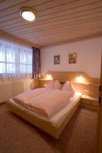 Postel nebo postele na pokoji v ubytování Ferienhaus Grubhof