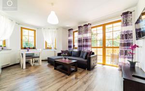 Posedenie v ubytovaní Wonder Home - Apartamenty w spokojnej okolicy, z widokiem na góry + 37 fotografií