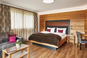 A bed or beds in a room at Residence La Selva