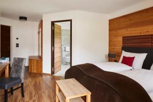 A bed or beds in a room at Residence La Selva