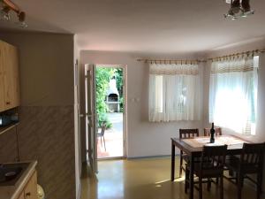 Kuchyň nebo kuchyňský kout v ubytování Apartment Jane