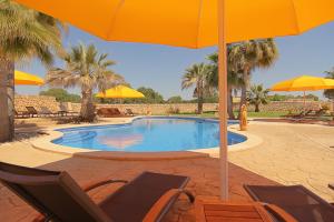 The swimming pool at or close to Puig de Ros d’Alt