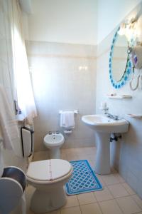 Koupelna v ubytování Hotel Velus