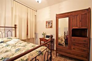 Postel nebo postele na pokoji v ubytování Affittacamere La Casa Di Elide