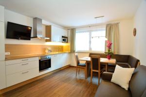 Kuchyň nebo kuchyňský kout v ubytování Apartment Plan de Socrep + 13 fotografií