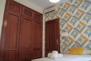 Posteľ alebo postele v izbe v ubytovaní Apartamento Ulises Suite 2