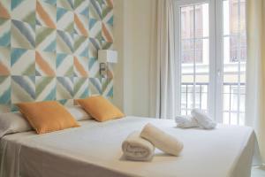 Posteľ alebo postele v izbe v ubytovaní Apartamento Ulises Suite 2