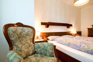 A bed or beds in a room at Sonnen Residence