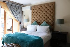 Katil atau katil-katil dalam bilik di Lucette Boutique Guesthouse +54 gambar