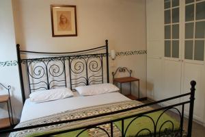 Postel nebo postele na pokoji v ubytování Jolly Residence