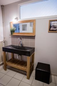 A kitchen or kitchenette at Les Appart'confort