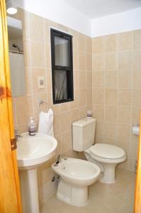 Ванная комната в Posada del Barranco Apart & Suites