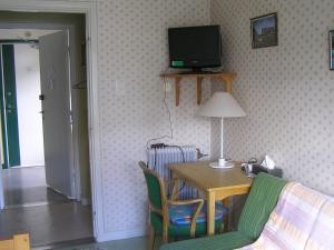 TV a/nebo společenská místnost v ubytování Fredrika Hotell Jakt&Fiskecamp