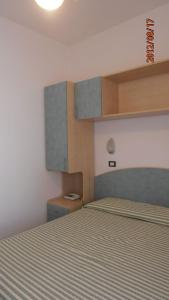 Postel nebo postele na pokoji v ubytování Hotel Garden