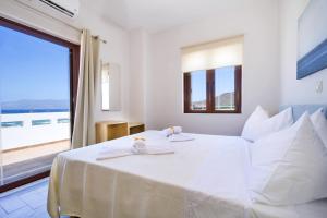Postel nebo postele na pokoji v ubytování Seaside Villa Balos