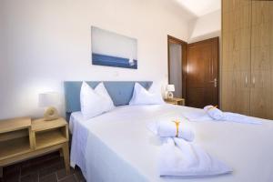 Postel nebo postele na pokoji v ubytování Seaside Villa Balos