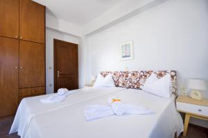 Postel nebo postele na pokoji v ubytování Seaside Villa Balos