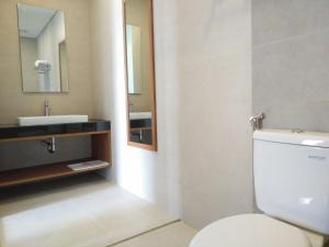 A bathroom at Java Village Resort by HOMEE Yogyakarta