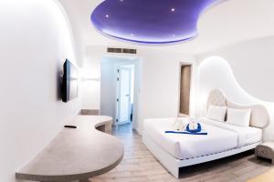 Ένα ή περισσότερα κρεβάτια σε δωμάτιο στο Avatara Resort