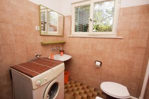 Koupelna v ubytování Apartments Plavica