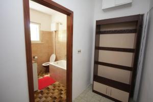Koupelna v ubytování Apartments Plavica + 37 fotografií