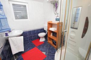 Koupelna v ubytování Apartments Plavica
