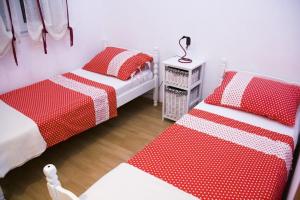 Postel nebo postele na pokoji v ubytování Apartments Plavica
